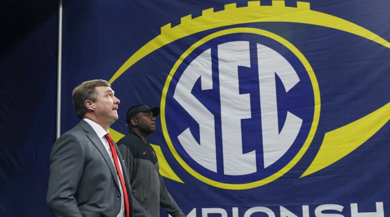 Georgia Bulldogs head coach Kirby Smart enters the Mercedes-Benz Stadium for the SEC Championship Game against the LSU Tigers in Atlanta on Saturday, Dec. 3, 2022. (Jason Getz/The Atlanta Journal-Constitution/TNS)