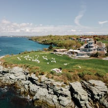 Perched atop a seaside cliff, Castle Hill Inn in Newport, Rhode Island overlooks the Atlantic Ocean. (Courtesy of Alex Paul Photography)