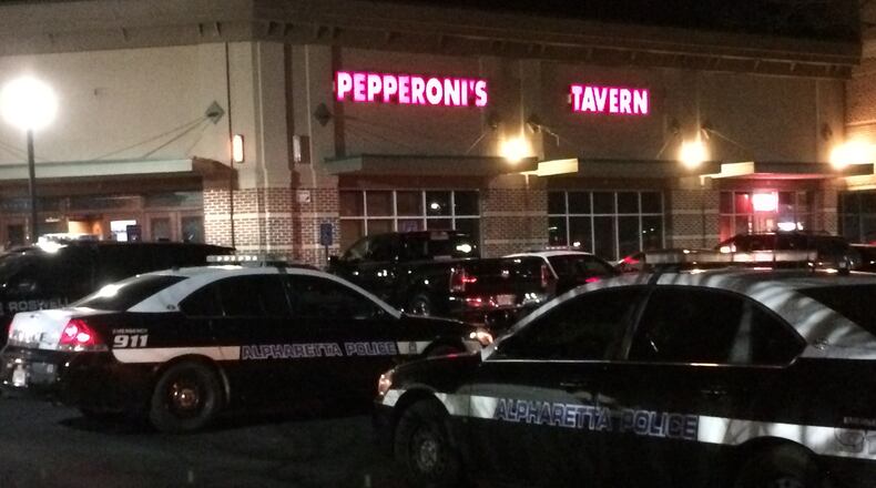 Alpharetta police and officers from Milton, Roswell and Johns Creek took part in a raid on Pepperoni’s Tavern on Old Milton Parkway. (Credit: Channel 2 Action News)