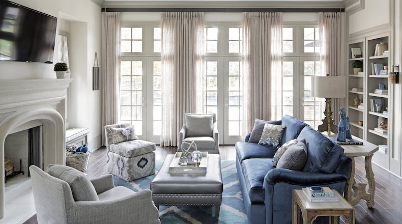 The living room in this young family’s new home in Brookhaven uses a soft neutral palette and pops of color that give it a fun yet elegant look. Kong designed the entire house from interior drawings to finishes and furnishings. Contributed by Mali Azima