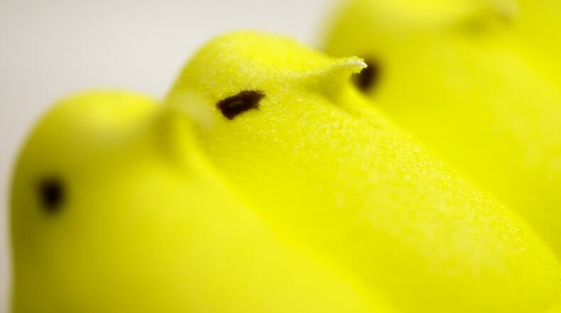 FILE - This Feb. 13, 2013 file photo shows Peeps at the Just Born factory in Bethlehem, Pa. Peeps holiday treats are going on hiatus — another consequence of the coronavirus. PennLive.com reports, Saturday, Sept. 12, 2020, that Just Born Quality Confections says it won’t be producing the popular sweets for Halloween, Christmas or Valentine’s Day as the Bethlehem, Pennsylvania-based company prepares for next Easter. Matt Rourke, File/ AP Photo