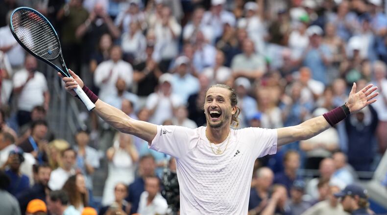 Alexander Zverev, of Germany, celebrates after he won the men's singles final of the U.S. Open tennis championships against Ben Shelton, of the United States, Sunday, Sept. 13, 2026, in New York. (AP Photo/Kirsty Wigglesworth)