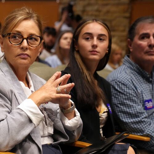 Sen. Darline Graham, R-S.C., from left, seated alongside daughter Nicole Nordone and husband Larry Nordone, looks on as a South Carolina Republican Senate candidate stump event gets underway ahead of the special GOP primary to replace her late brother, Sen. Lindsey Graham, R-S.C., Saturday, Aug. 1, 2026, in Lexington, S.C. (AP Photo/Meg Kinnard)