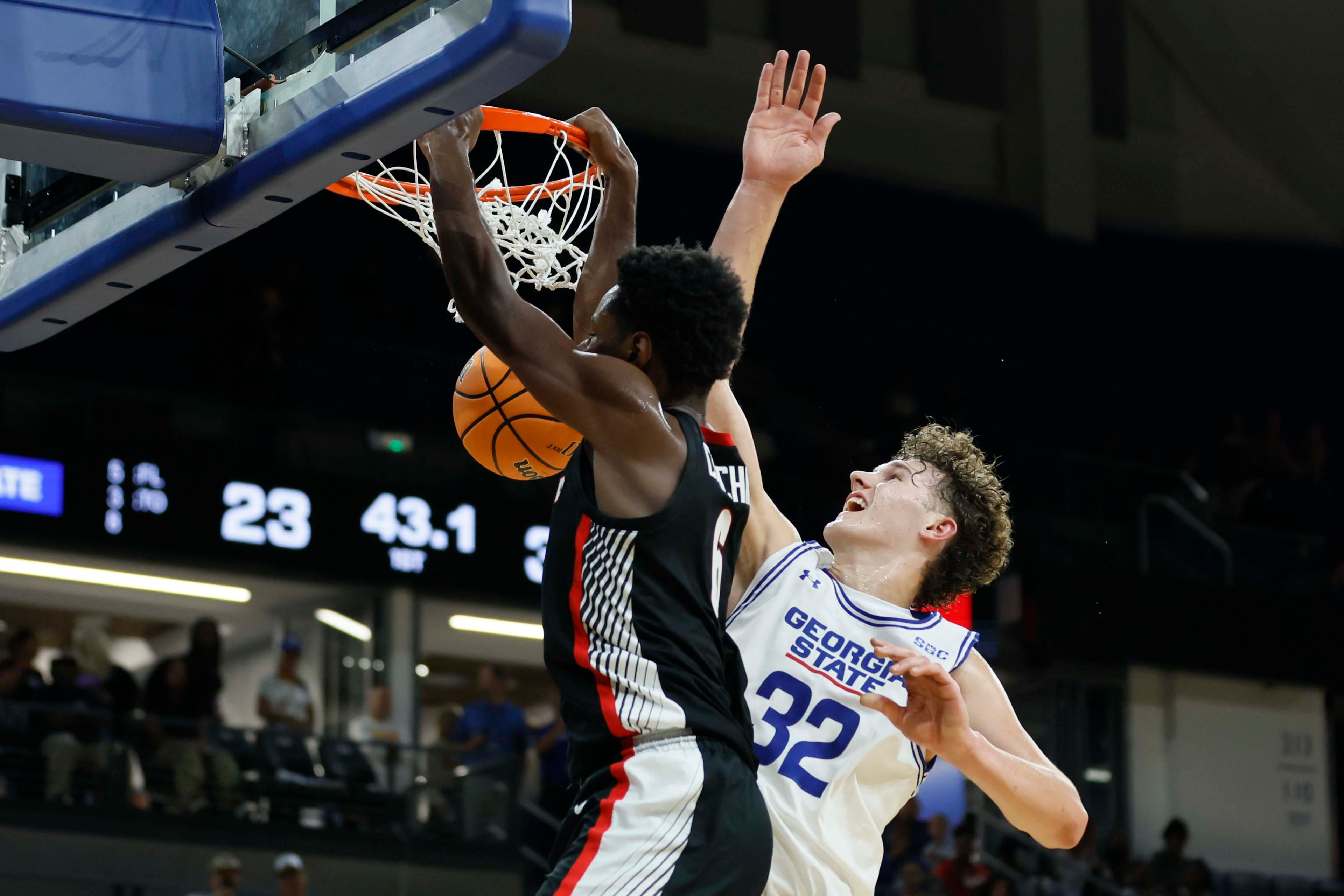 Georgia Bulldogs forward Kanon Catchings (6) dunks over Georgia State Panthers center Christian Beam (32) during the first half of an exhibition opener game at the Georgia State Convocation Center, Wednesday, October 15, 2025, in Atlanta.
(Miguel Martinez/ AJC)