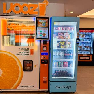 An iJooz vending machine is seen inside a building in Singapore, Thursday, April 30, 2026. (AP Photo/David Hu)