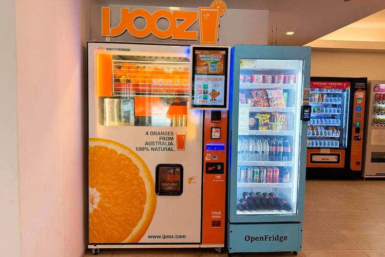 An iJooz vending machine is seen inside a building in Singapore, Thursday, April 30, 2026. (AP Photo/David Hu)