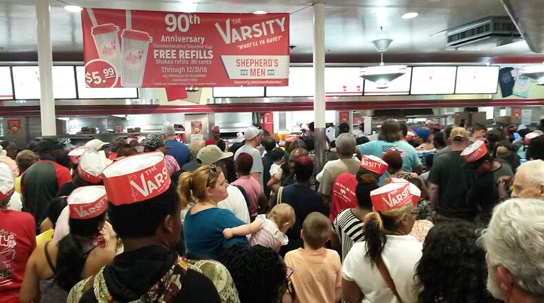 The Varsity held a 90th birthday celebration on Saturday, Aug. 18, 2018, at its Atlanta location. Customers were able to order any item off the menu for 90 cents to mark the occasion. (Photo: MATT KEMPNER / AJC)