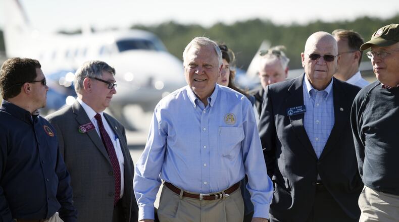 Governor Nathan Deal visited the Cook County airport in Adel, Georgia in January 2017 in the wake of deadly tornadoes and storms that hit southern Georgia. He took a tour of the damaged areas and talked with some of the victims. (DAVID BARNES / DAVID.BARNES@AJC.COM)