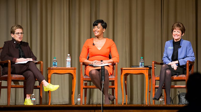 Atlanta mayoral candidates Keisha Lance Bottoms, center, and Mary Norwood, right, participate in a forum moderated by former Atlanta City Council President Cathy Woolard, left, at the Carter Center, Tuesday, November 28, 2017. ALYSSA POINTER/ALYSSA.POINTER@AJC.COM