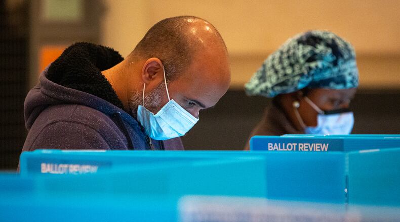 A voter makes ballot selections at Landmark Church in Peachtree Corners, Georgia, on Tuesday, Nov. 3, 2020. (Casey Sykes/The Atlanta-Journal Constitution/TNS)