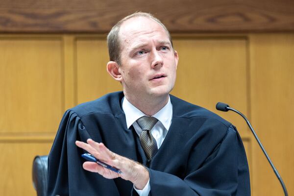 Judge Scott McAfee presides over a hearing regarding media access in the case against former President Donald Trump and 18 others at the Fulton County Courthouse in Atlanta on Aug. 31, 2023. (Arvin Temkar/The Atlanta Journal-Constitution/TNS)