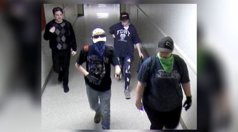 Rome police are trying to identify these four suspects in relation to a theft from North Heights Elementary School.