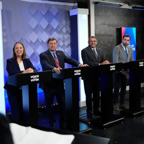 From podium left, U.S. Senate candidates Shenna Bellows, Troy Jackson, Dr. Nirav Shah, and Jordan Wood talk with moderator Phil Hirschkorn at WCSH-6 before a televised debate at the WCSH-6 studio Thursday, July 16, 2026, in Portland, Maine. (AP Photo/Robert F. Bukaty)