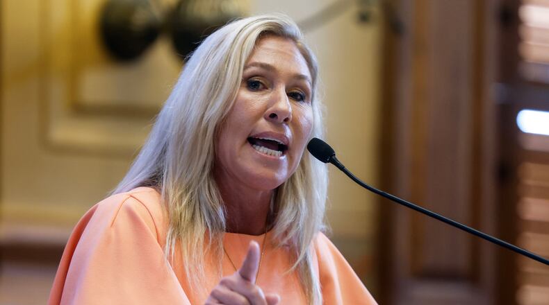 U.S. Rep. Marjorie Taylor Greene, R-Rome, told constituents in Floyd County on Thursday night that she is willing to shut down the federal government if her demands aren't met. They include impeaching President Joe Biden and lining out federal funding for COVID-19 vaccines and the war in Ukraine. (Natrice Miller/The Atlanta Journal-Constitution/TNS)