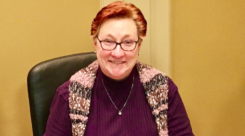 Peggy Merriss, at the close of her final meeting as Decatur city manager on Monday Dec. 17. Merriss had presided over the city for 25 1/2 years. Bill Banks for the AJC