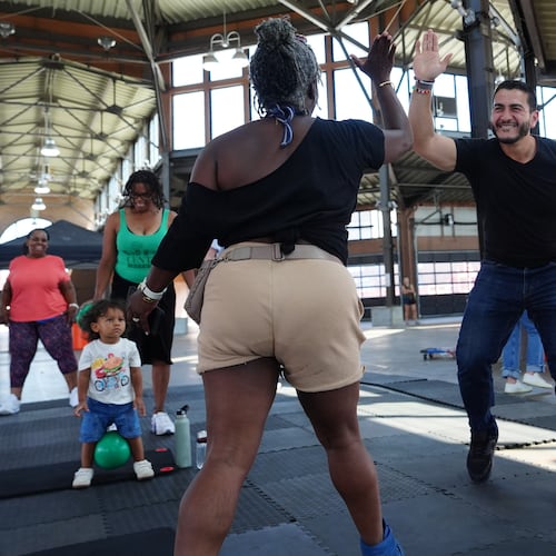 Abdul El-Sayed, a progressive candidate in the Democratic primary for U.S. Senate in Michigan, visits Eastern Market on election day, Tuesday, Aug. 4, 2026, in Detroit. (AP Photo/Julia Demaree Nikhinson)