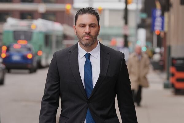 Former NFL and University of Michigan assistant football coach Matt Weiss leaves federal court in Detroit, Monday, March 24, 2025. (AP Photo/Paul Sancya)