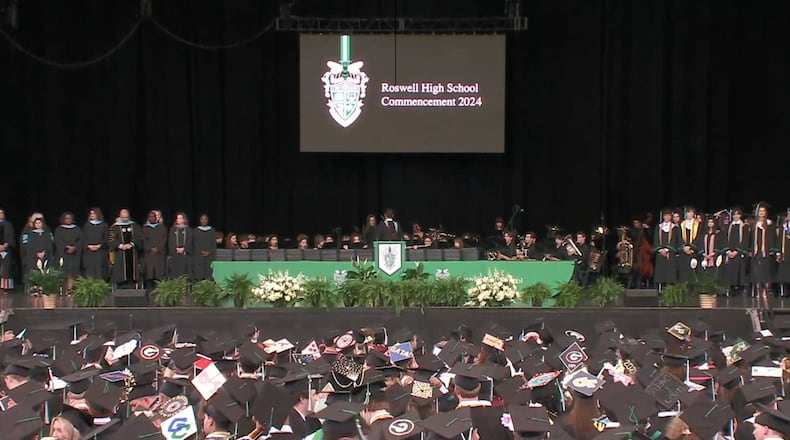 Roswell High School graduates prepare for their next chapter after receiving their diplomas. What do students need to get to this happy moment? (Courtesy of Fulton County Schools)