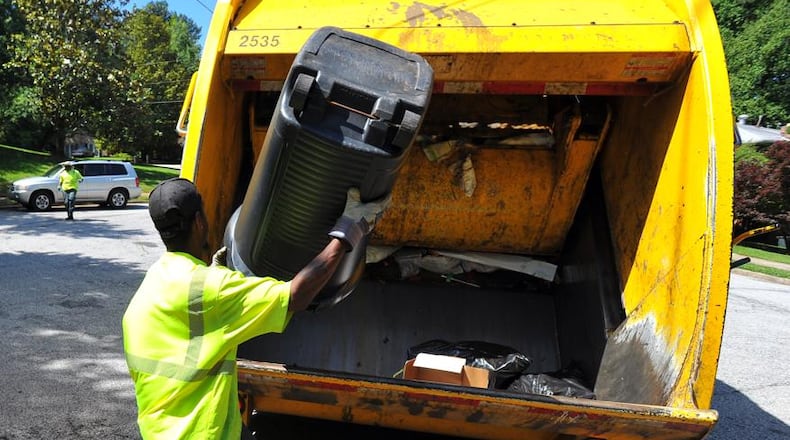 Cobb commissioners tabled regulations on sanitation services after feedback from residents and garbage company owners. AJC file photo