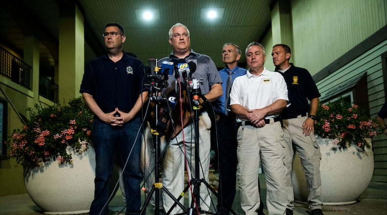 Matthew Weintraub, District Attorney for Bucks County, Pa., speaks with members of the media in New Hope, Pa., Thursday, July 13, 2017. Authorities said they've found human remains in their search for four missing young Pennsylvania men and they can now identify one victim. (AP Photo/Matt Rourke)