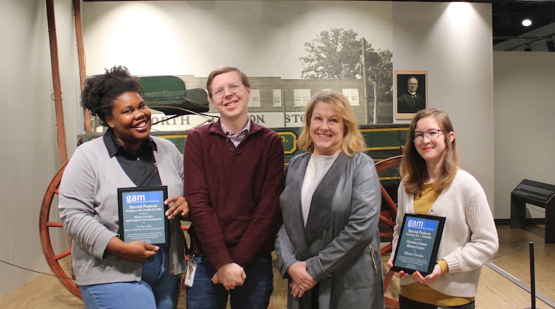 Two awards were given last month by the Georgia Association of Museums to History Cherokee. Award winners for the Cherokee County History Center are (l-r) Harvee White, Thomas Paterson, Stefanie Joyner and Kaylee Johnson. (Courtesy of Cherokee County History Center)