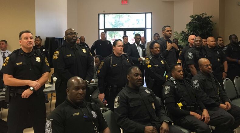About 50 police officers watched as the DeKalb County Board of Commissioners rejected pay raises Tuesday. MARK NIESSE / MARK.NIESSE@AJC.COM