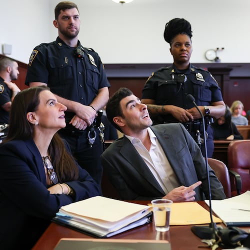 Luigi Mangione appears in court alongside his attorneys Karen Friedman Agnifilo, left, and Marc Agnifilo for an evidence hearing, Thursday, Dec. 4, 2025, in New York. (Angela Weiss/Pool Photo via AP)