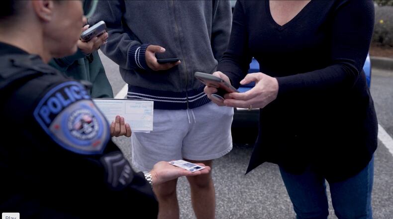 The Alpharetta Department of Public Safety has partnered with Montana-based Police Smart Card to pilot to replace police officers’ business cards with high-tech smart cards. (Courtesy Police Smart Card)