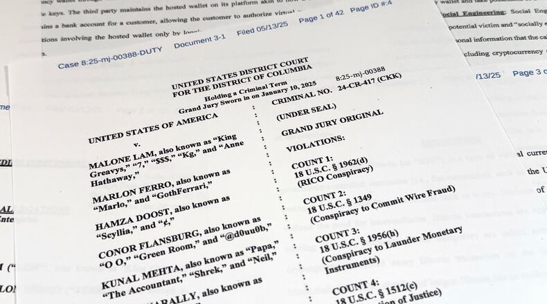 This Justice Department grand jury superseding indictment against Malone Lam and his co-defendants is photographed Friday, Sept. 4, 2026. (AP Photo/Jon Elswick)