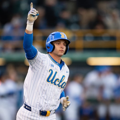 FILE - UCLA's Roch Cholowsky reacts after hitting a home run during an NCAA baseball game against Texas Christian, Feb. 20, 2025, in Los Angeles. (AP Photo/Kyusung Gong, File)