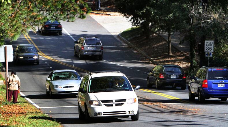 SANDY SPRINGS: Traffic flows along Hammond Drive between Glenridge Drive and Roswell road. Phil Skinner pskinner@ajc.com