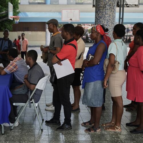 Haitians register to vote in the upcoming general election in Port-au-Prince, Haiti, Friday, July 31, 2026. (AP Photo/Odelyn Joseph)