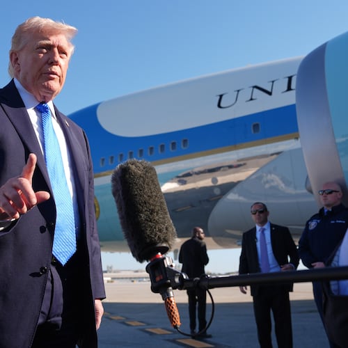 President Donald Trump speaks with the media before boarding Air Force One, Monday, March 23, 2026, at Palm Beach International Airport in West Palm Beach, Fla. (AP Photo/Mark Schiefelbein)