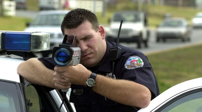 “Targeted speed enforcement” by the police is one of 17 options for getting drivers to slow down as part of Johns Creek’s Traffic Calming Policy. AJC FILE
