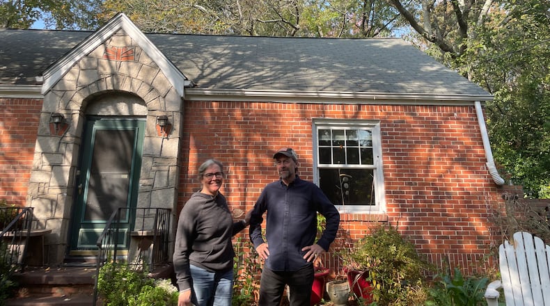 Alicia and Hal Jacobs got a letter from their insurance company warning that their homeowners policy would be cancelled because of trees overhanging their home.