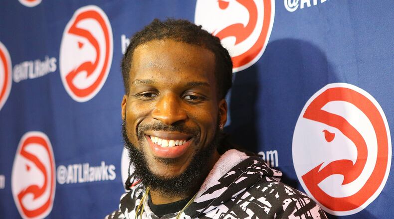 The Hawks’ DeMarre Carroll, who will become a free agent July 1, can’t help but smile when asked about the payday he will likely have coming while taking questions from the media during team exit interviews on Thursday, May 28, 2015, in Atlanta. Curtis Compton / ccompton@ajc.com