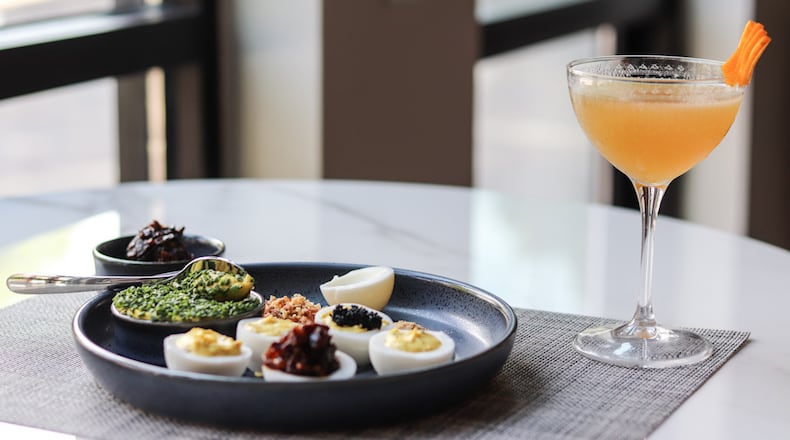 At One Flew South on the Eastside Beltline, you can garnish your deviled eggs with radish matchsticks, fried shallots, smoked salt and black pepper. Bacon jam, tuna poke, caviar and roe can be added for an upcharge. Courtesy of Tori Allen PR