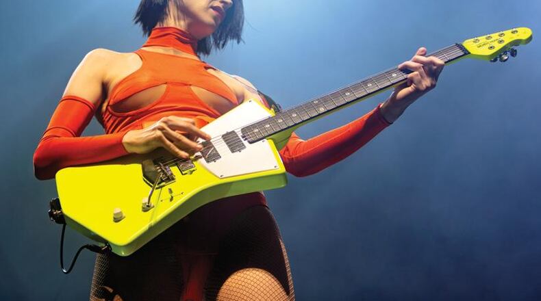 Annie Clark (aka St. Vincent) plays the Ernie Ball Music Man signature guitar that was designed especially for her. It will be part of the Museum of Design Atlanta "Wood & WIre" exhibition.