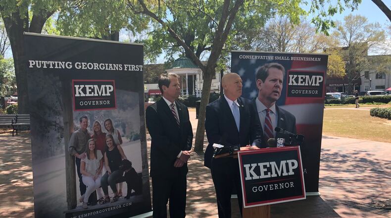 Cobb District Attorney Vic Reynolds and Secretary of State Brian Kemp unveil an anti-gang initiative that's a key part of Kemp's campaign for Georgia governor. AJC/Greg Bluestein