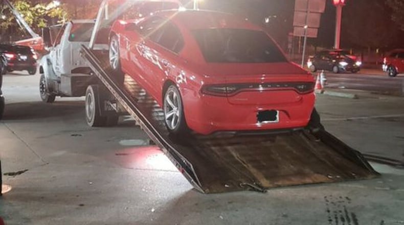 An 18-year-old accused of blocking traffic on the Downtown Connector during an illegal street racing last weekend was arrested Saturday, authorities said.