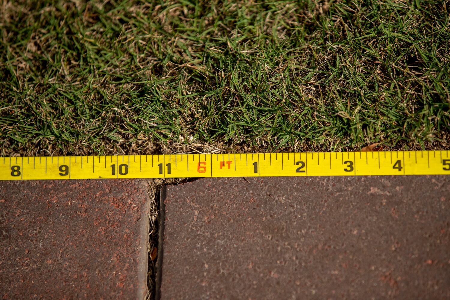 Measuring tape is used to social distance each private pod for the Big Night Out concert series at Centennial Olympic Park in downtown Atlanta, on Thursday, October 22, 2020. Rival Entertainment is presenting the series in coordination with the Georgia World Congress Center Authority and will offer Atlanta fans an experience with private pods.  The Big Night Out will commandeer the downtown park with shows by Moon Taxi and Pigeons Playing Ping Pong (Oct. 23), Marcus King Trio and Futurebirds (Oct. 24) and Big Boi and Friends featuring KP the Great (Oct. 25). (Alyssa Pointer / Alyssa.Pointer@ajc.com)