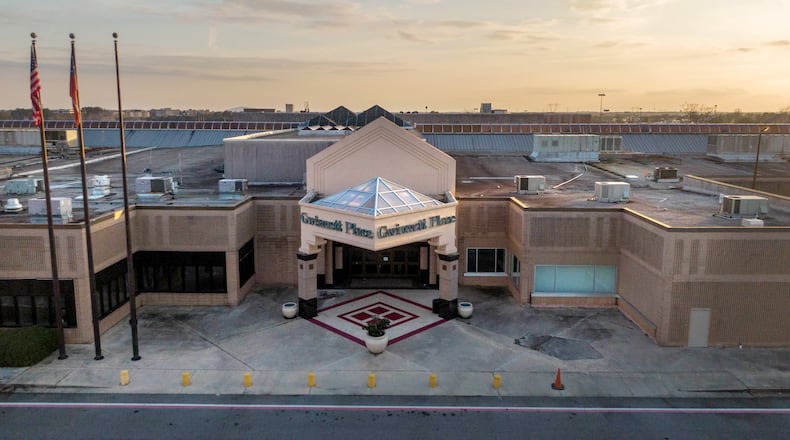 Aerial photo shows Gwinnett Place Mall in Duluth. Gwinnett County closed on its purchase of the mall Thursday. (Hyosub Shin / Hyosub.Shin@ajc.com) AJC FILE PHOTO