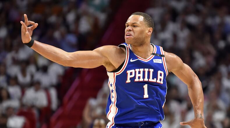 Justin Anderson of the Philadelphia 76ers reacts after hitting a 3-pointer in the third quarter of the game against the Miami Heat at American Airlines Arena on April 19, 2018 in Miami, Florida.