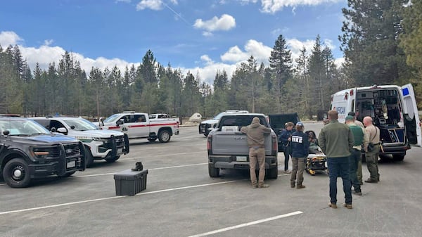 This image provide by the Fresno County Sheriff's Office, shows Tiffany Slaton, of Jeffersonville, Ga., when she was rescued in Fresno County, Calif., Wednesday, May 14, 2025 after being reported missing in the High Sierra for three weeks. (Fresno County Sheriff's Office via AP)