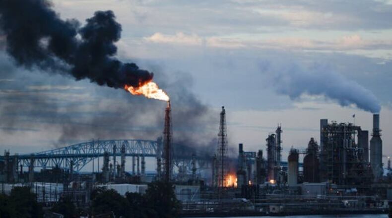 Flames and smoke billow from the Philadelphia Energy Solutions Refining Complex early Friday.