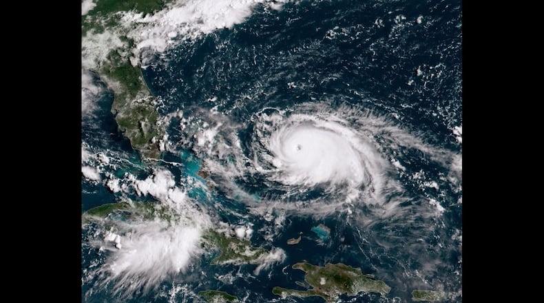 ATLANTIC OCEAN - AUGUST 31: In this NOAA GOES-East satellite handout image, Hurricane Dorian, a Cat. 5 storm, tracks towards the west over the Bahamas. Photo by NOAA via Getty Images