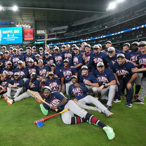 Atlanta Braves players and coaches take a group photo on the field after a baseball game against the Houston Astros as the Braves clinched the NL East title, Sunday, Sept. 20, 2026, in Houston. (Karen Warren/AP)