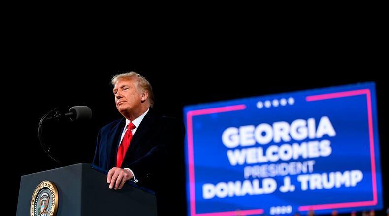 President Donald Trump speaks during a rally to support Republican Senate candidates at Valdosta Regional Airport in Valdosta, Georgia, on Saturday, Dec. 5, 2020. (Andrew Caballero-Reynolds/AFP/Getty Images/TNS)