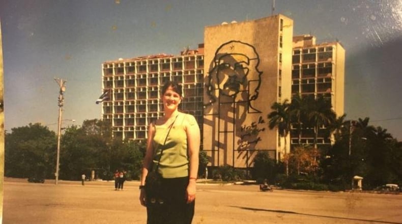 Dabney P. Evans, an assistant professor at Emory University’s Rollins School of Public Health, in 2003. She met Fidel Castro on a 2006 visit to Cuba. Here’s she is in front of an image of Marxist revolutionary Che Guevara on an Havana building. HANDOUT