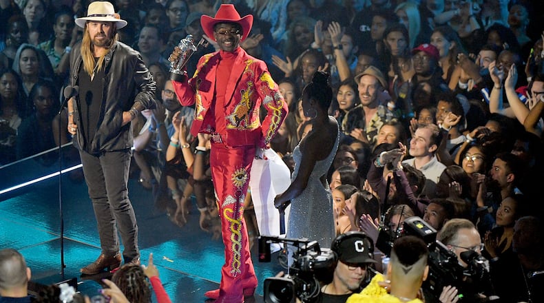 Billy Ray Cyrus and Lil Nas X speak onstage during the 2019 MTV Video Music Awards at Prudential Center on August 26, 2019 in Newark, New Jersey. (Photo by Mike Coppola/Getty Images for MTV)